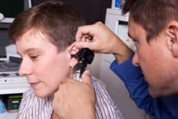 Woman gets ear examined
